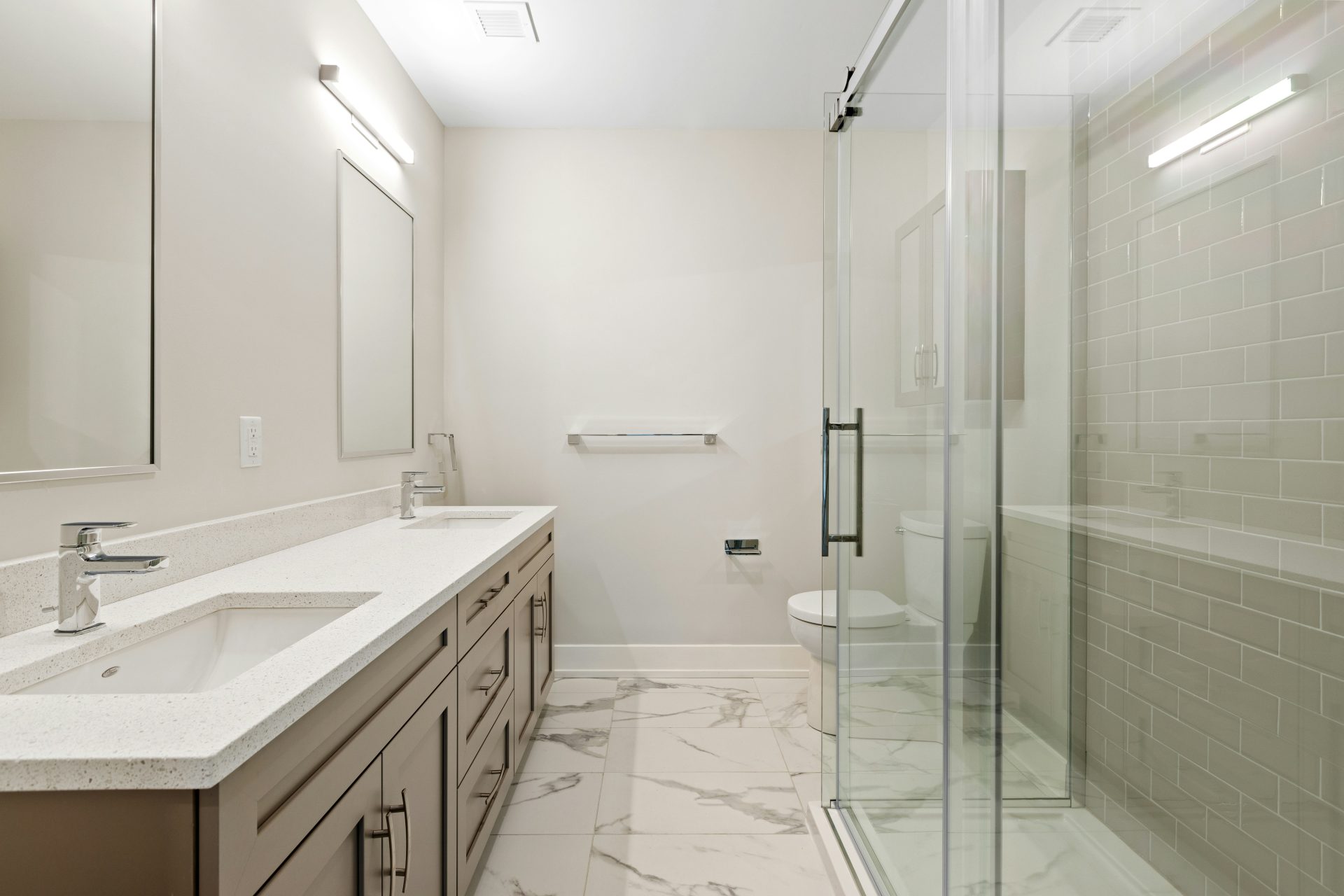 white ceramic sink near mirror