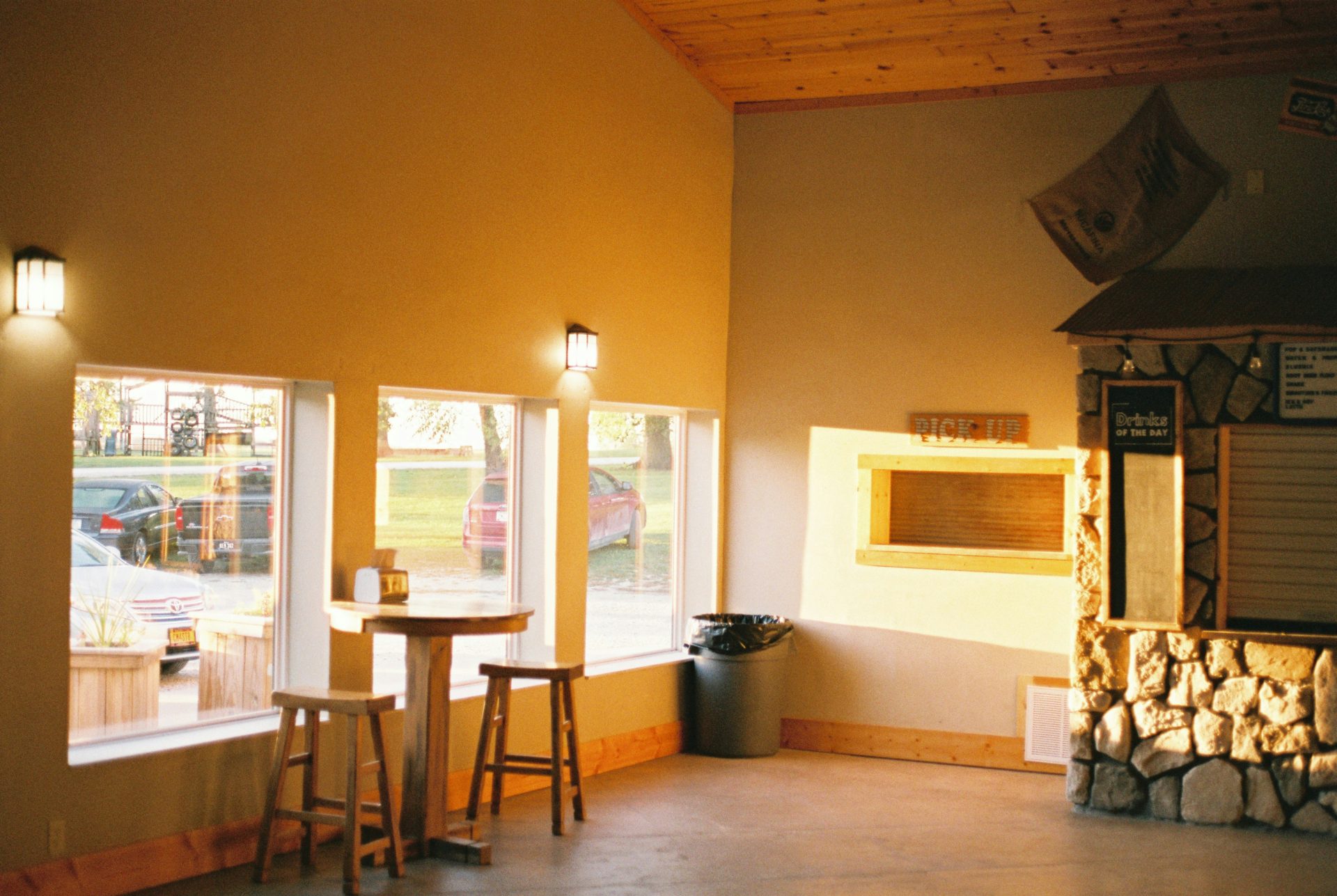 a room with three stools and a fire place