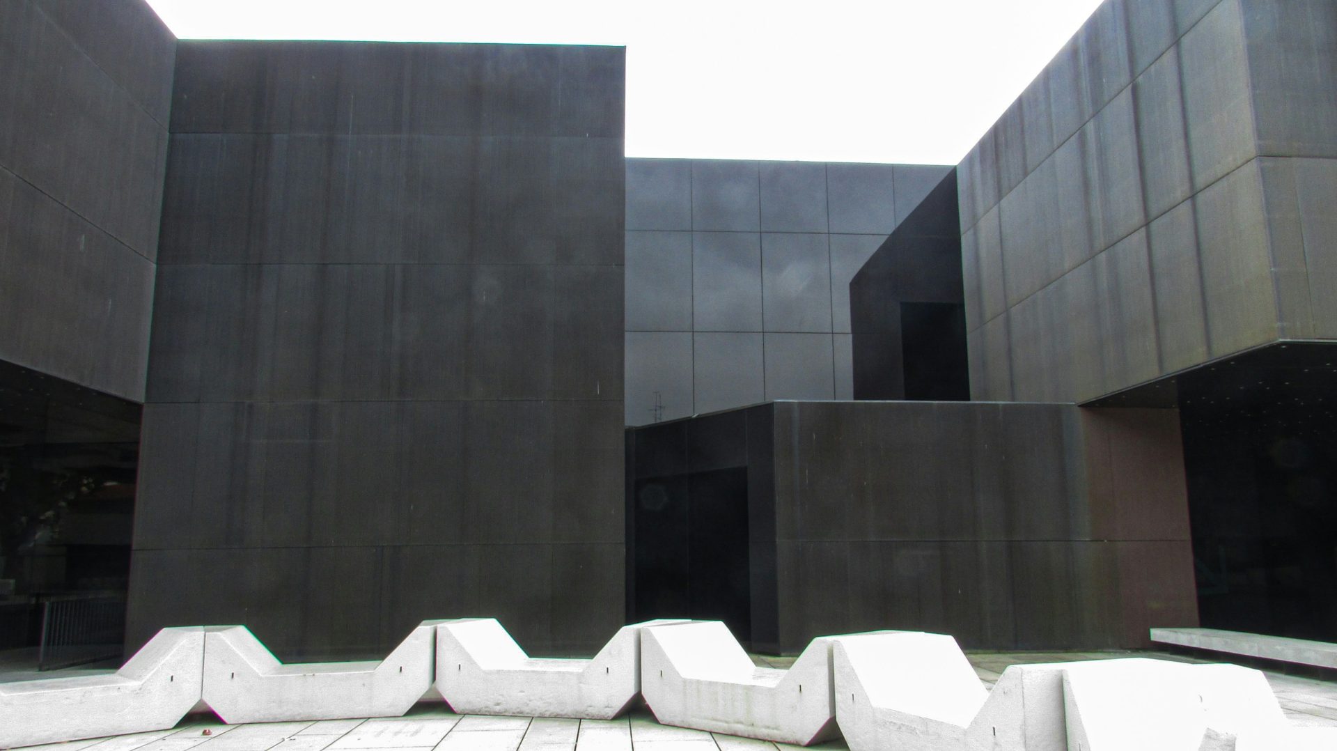 a building that has a bunch of concrete blocks in it